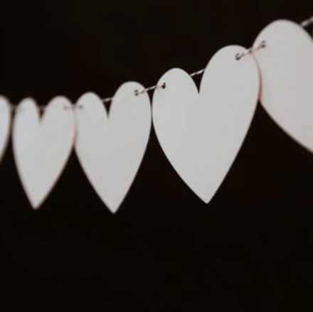 white hearts on string image