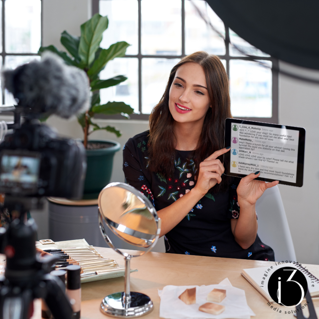 woman live streaming a beauty routine with an ipad image